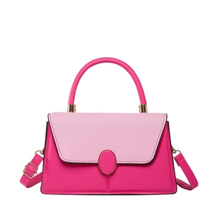 Elegant rose pink top-handle bag with woven leather panel and gold hardware details