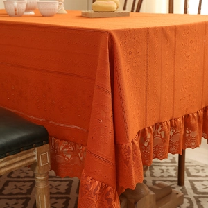 Bright orange Nordic lace tablecloth with ruffled edges and jacquard floral texture