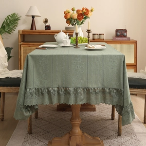 Sage green rectangular tablecloth with vintage floral embroidery and lace borders