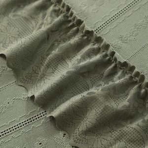 Sage green vintage lace tablecloth featuring elegant 3D floral embroidery and ruffled edge