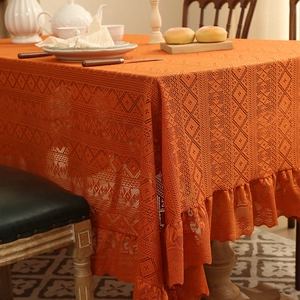 Caramel orange lace tablecloth with hollow diamond pattern and elegant ruffled edge