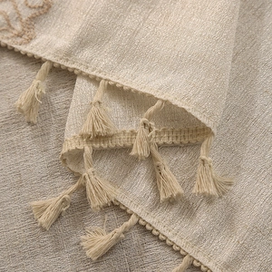 Linen textured tablecloth with woven bohemian lace edges and handmade tassels