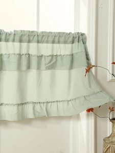 Detail of light green cafe curtain with three-layer ruffles and rod pocket design