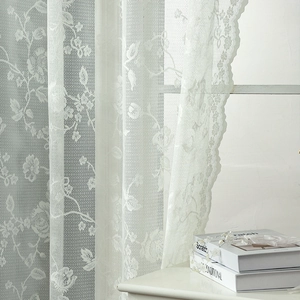 Elegant white French lace curtain featuring vintage rose embroidery and scalloped edges