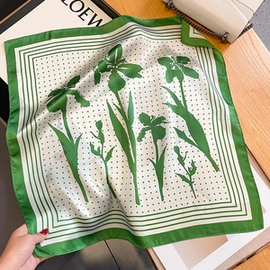 Floral silk square scarf in green and white with elegant flower patterns and polka dots