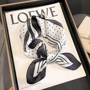 Silk square scarf with black and white polka dot and floral pattern in a satin finish