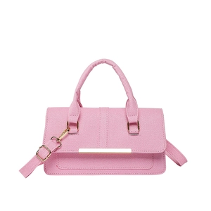 French style pink twill handbag with gold hardware and adjustable crossbody strap