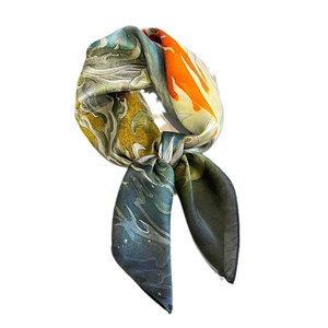 Elegant mulberry silk square scarf with colorful abstract flowing patterns in vibrant tones