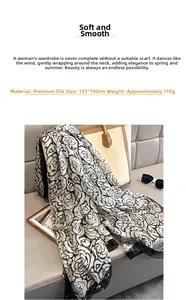 Detail showing oversized 135x190cm silk scarf with camellia print draped on leather sofa