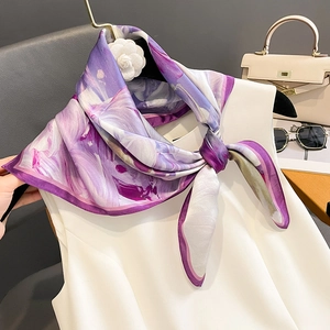 Silk square scarf with abstract purple print and camellia detail on white top