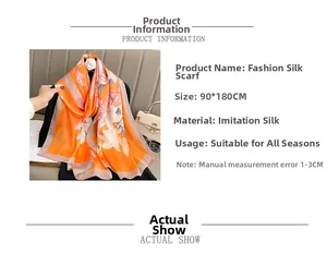 Detail of 90x180cm orange floral satin scarf with lily print and smooth texture