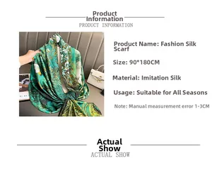 Detail of 90x180cm silk scarf showing green floral print and smooth imitation silk texture