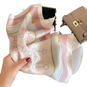 Silk scarf with equestrian horsebit print in pink, beige, and blue-gray colors