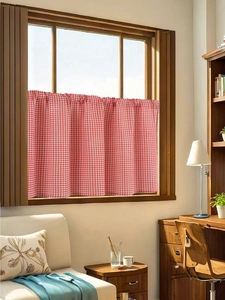 Detail of red and white plaid cotton linen cafe curtain with pleated hanging effect