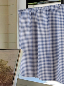 Detail view of blue gingham cotton linen cafe curtain with pleated top heading design