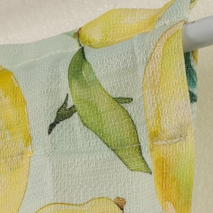 Fresh lemon pattern curtains with yellow fruit on light teal fabric for bedroom