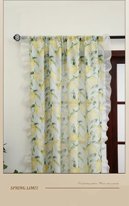Detail of yellow lemon oil painting print on cafe curtain with white ruffle trim