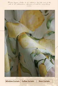 Close-up of pastoral yellow lemon print curtain with detailed fabric texture and drape