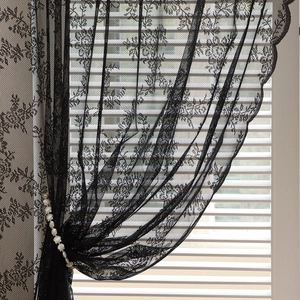 French vintage black floral lace curtain with elegant scallop edges and pearl tieback
