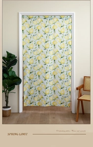 Detail of yellow lemon pattern curtain in a cozy room with plants and a wicker chair