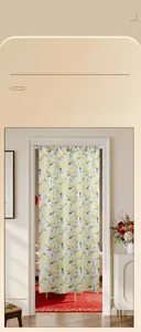 Detail of lemon pattern door curtain with telescopic rod and fresh floral print