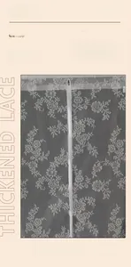 Detail view of thickened white lace door curtain with retro rose pattern and magnetic strips