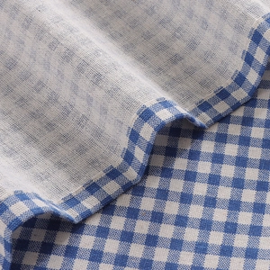 Blue and white gingham fabric door curtain made of cotton linen with texture