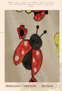 Detail of white checkered curtain featuring red ladybug and floral embroidery patterns