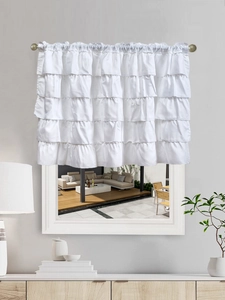 Detail of white tiered ruffle cafe curtain on a rod in a minimalist interior setting