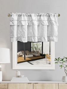 Detail of white multi-layer ruffled tier curtain with rod pocket for window decor