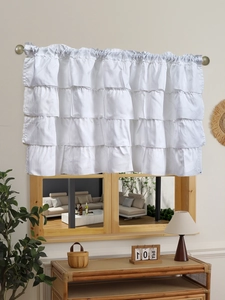 Close-up of white five-layer ruffled cafe curtain with soft tiered pleated fabric texture