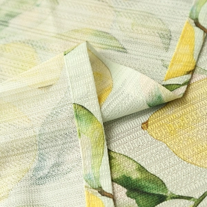 Fresh lemon print curtains in rustic yellow and green coarse fabric with fine hemmed edges