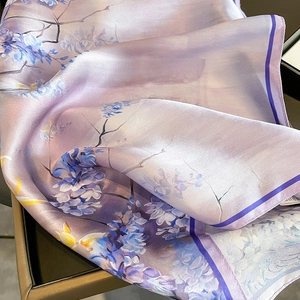 Elegant mulberry silk scarf with purple floral pattern and delicate stitched edges