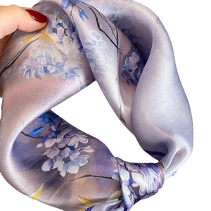 Elegant mulberry silk square scarf with light purple floral prints and satin finish