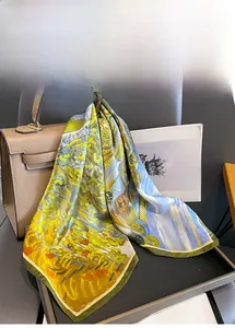Detailed texture of impressionist oil painting style silk scarf draped on a bag