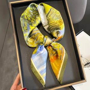 Artistic oil painting mulberry silk scarf displayed in a premium black gift box
