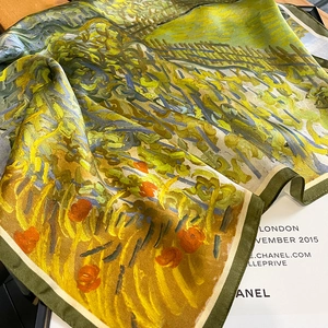 Detailed view of silk square scarf featuring Van Gogh oil painting print with satin luster