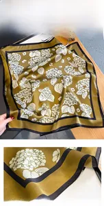 Detail of silk floral scarf showing high-quality anti-snagging edge and printed pattern