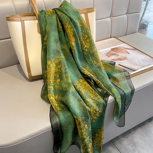 Floral print oversized beach shawl with dark green silk texture and sheer mesh border
