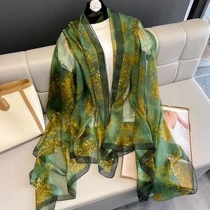 Dark green floral chiffon scarf with golden blossom print and Chinese cloud patterns
