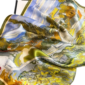Fashionable silk scarf with Van Gogh oil painting print showing vibrant yellow sunflowers