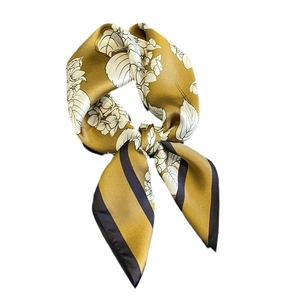 Elegant mustard yellow silk scarf with white floral print and striped border design