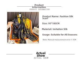 Detail view of 90x180CM black floral faux silk shawl with orange border trim