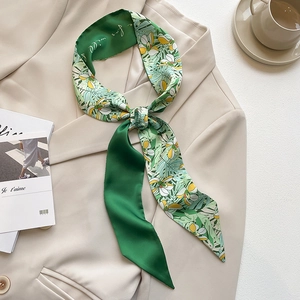 French emerald green silk neck scarf with elegant tropical leaf and flower patterns