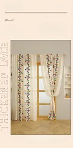 Detailed close-up of embroidered colorful butterflies on ivory lace curtain fabric