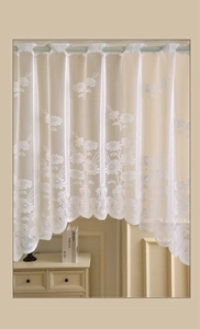 Detailed embroidery of white daisy lace patterns on a sheer cafe curtain fabric