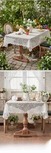 Detailed close-up of intricate white floral lace patterns and wavy scalloped edges on a tablecloth