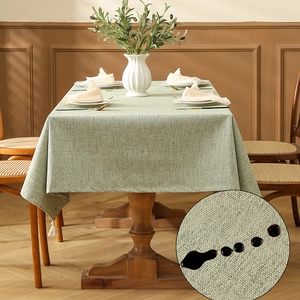 Wasserfeste Tischdecke in Bohnengrün aus Leinen mit Detail der Flüssigkeitsabweisung