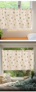 Detail of cactus embroidery and white tassel fringe on linen cafe curtains