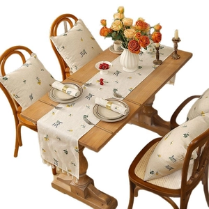 Linen table runner with wheat embroidery and tassels for rustic dining decor